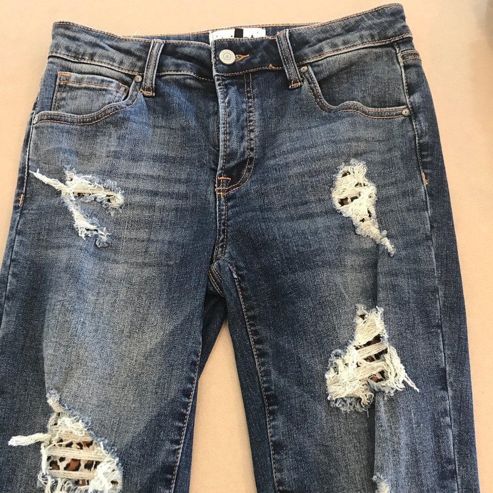 Tricot distressed leopard jeans